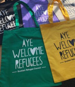 Aye Welcome Refugees tote bags in five colours