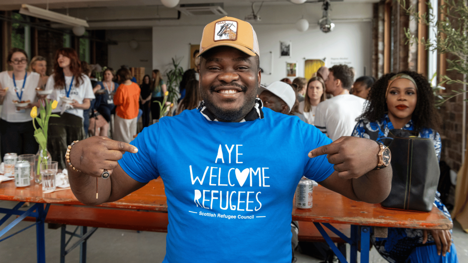 Get your Aye Welcome Refugees t-shirts and tote bags