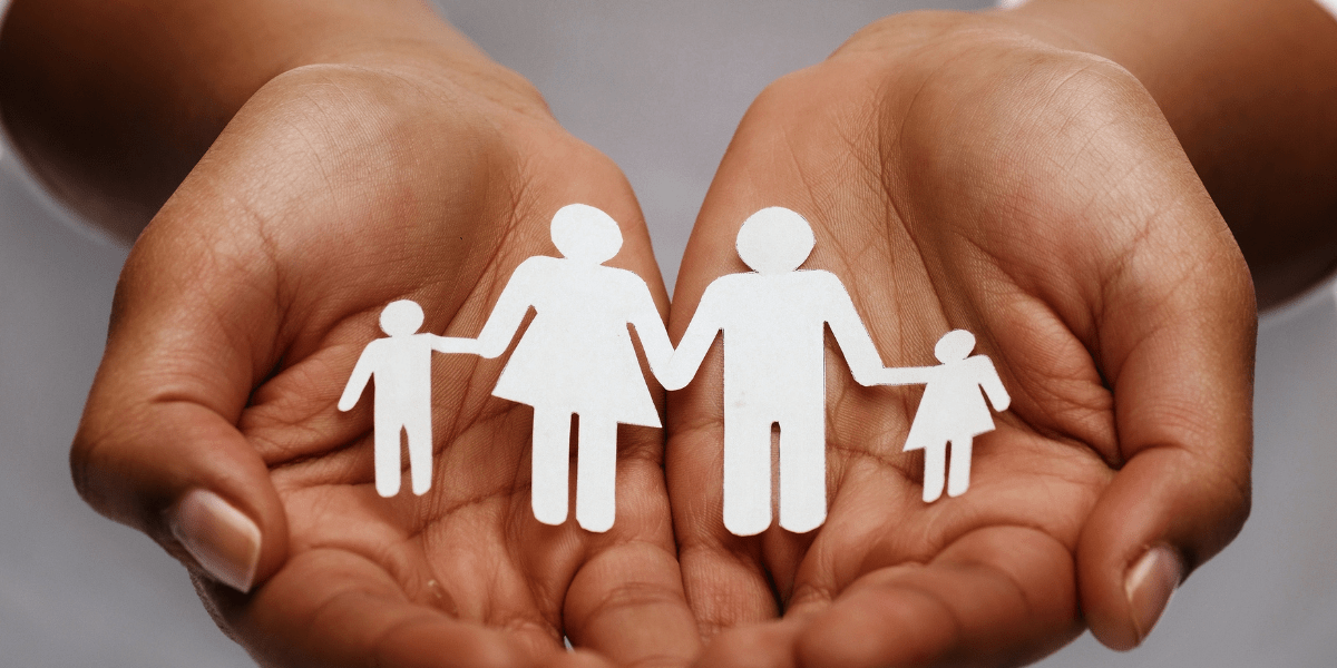 Hands holding family 1200 x 600